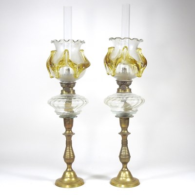 Lot 207 - A pair of brass oil lamps, with frilled glass...