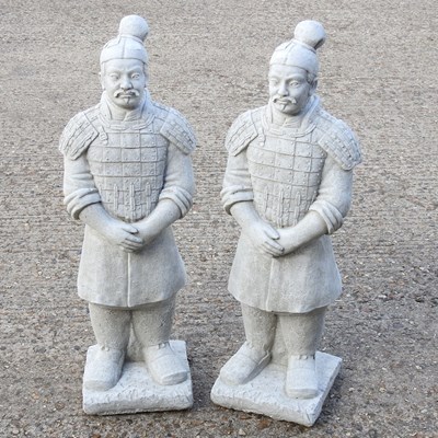 Lot 557 - A pair of cast stone garden statues, of...