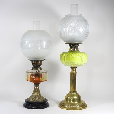 Lot 360 - A brass oil lamp with an etched glass shade,...