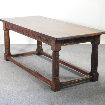 Lot 579 - A handmade oak refectory dining table, on...