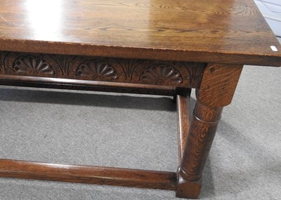 Lot 579 - A handmade oak refectory dining table, on...