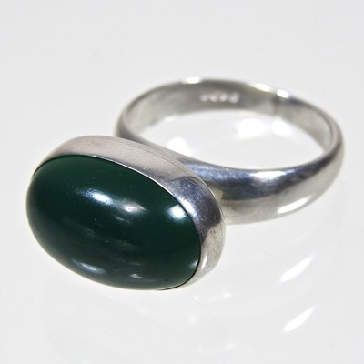 Lot 280 - A Georg Jensen silver and green onyx ring, of...