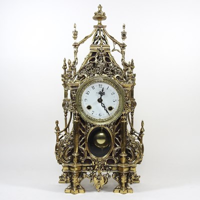 Lot 93 - An ornate continental brass cased mantel clock,...