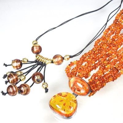 Lot 112 - A silver and amber bead necklace, boxed,...