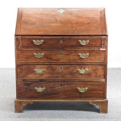 Lot 21 - A George III mahogany bureau, on bracket feet