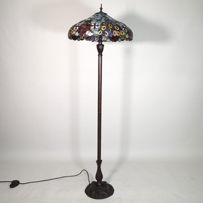 Lot 652 - A Tiffany style standard lamp, with a stained...