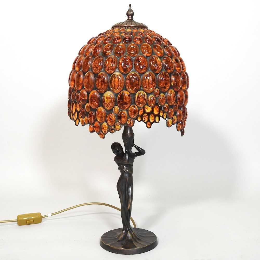 Lot 409 - A Tiffany style figural table lamp, with an...