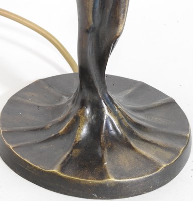 Lot 409 - A Tiffany style figural table lamp, with an...