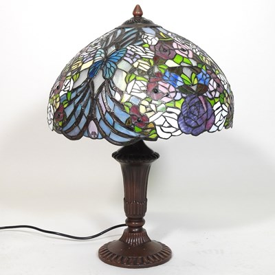 Lot 60 - A Tiffany style table lamp, with a stained...