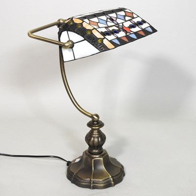 Lot 7 - A Tiffany style desk lamp, with a stained...