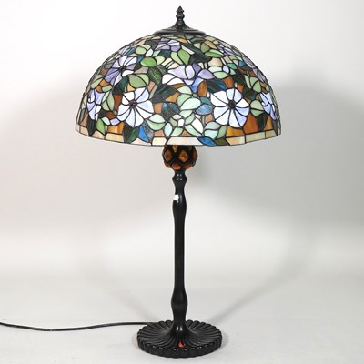 Lot 329 - A Tiffany style metal table lamp, with a...