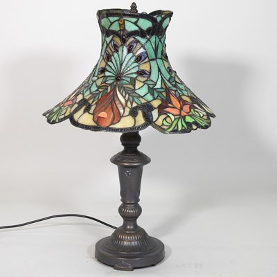 Lot 194 - A Tiffany style metal table lamp, with a...