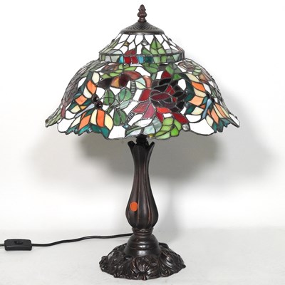 Lot 387 - A Tiffany style table lamp, with a stained...