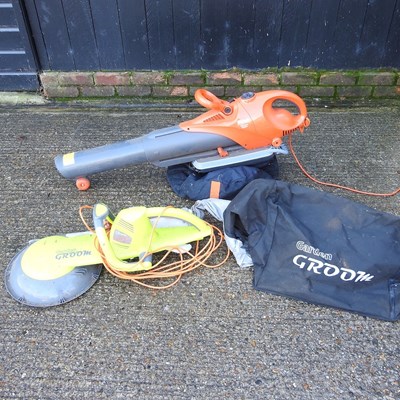 Lot 579 - An electric Garden Groom hedge trimmer,...