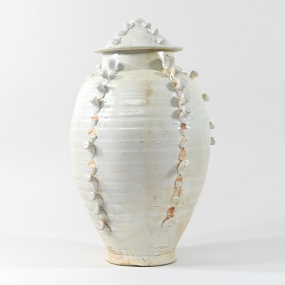Lot 222 - A Chinese white Qingbai glazed pottery jar and cover