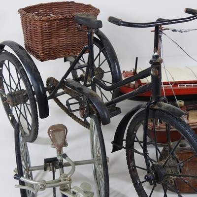 Lot 416 - A metal model of a vintage tricycle, 28cm,...