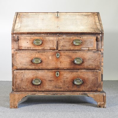 Lot 289 - An 18th century walnut and crossbanded bureau,...