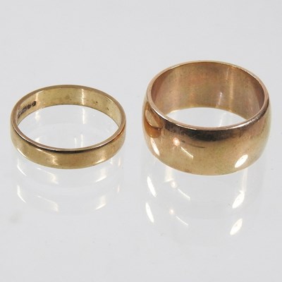 Lot 260 - A 9 carat gold wedding band, 7.2g, size P, 9mm...