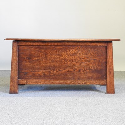 Lot 673 - An early 20th century oak coffer, of tapered...