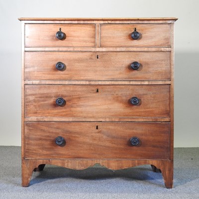 Lot 306 - A George III mahogany chest of drawers, with a...