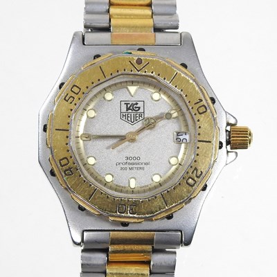 Lot 140 - A Tag Heuer 3000 ladies steel and gold plated...