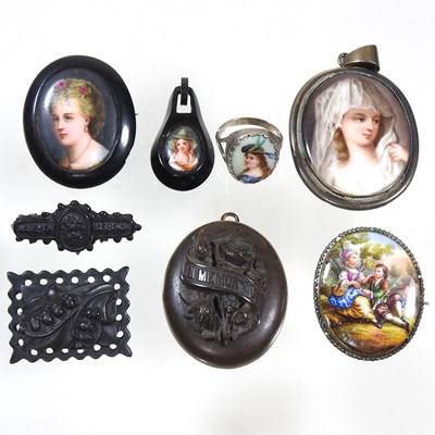 Lot 171 - A Victorian jet portrait brooch, painted with...