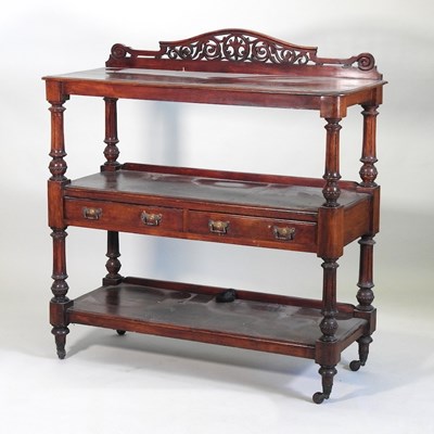 Lot 170 - A Victorian mahogany three tier buffet, with a...