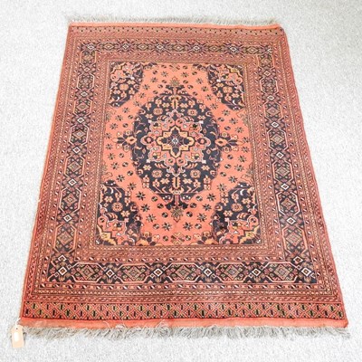 Lot 312 - A Persian rug, the central medallion, within a...