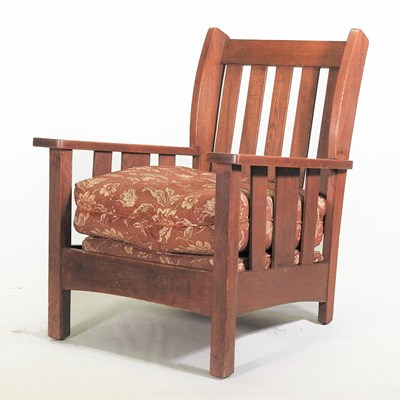 Lot 619 - An Arts and Crafts oak armchair