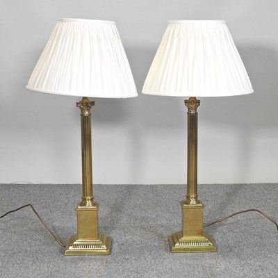 Lot 299 - A pair of large brass table lamps and shades,...