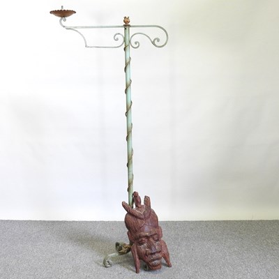 Lot 309 - A painted iron candlestand, 158cm high,...