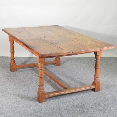 Lot 341 - A modern hand made oak refectory dining table,...