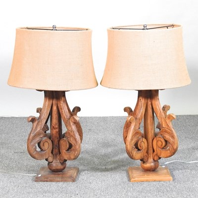 Lot 492 - A pair of French carved wooden table lamps and...