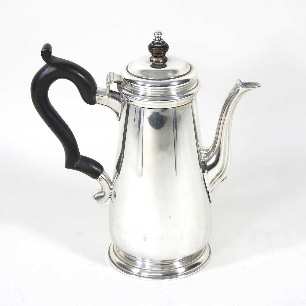 Lot 573 - An early 20th century silver coffee pot, of...