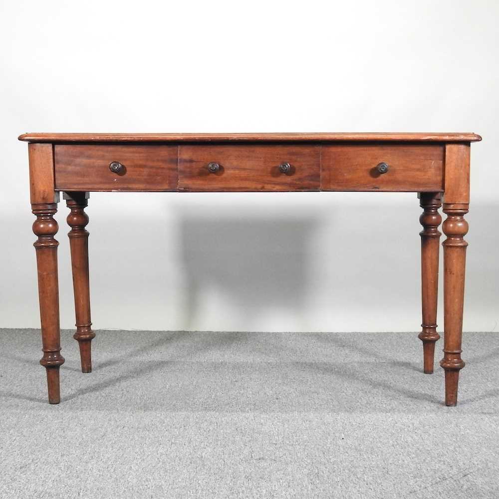 Lot 481 - A Victorian mahogany side table, on turned legs