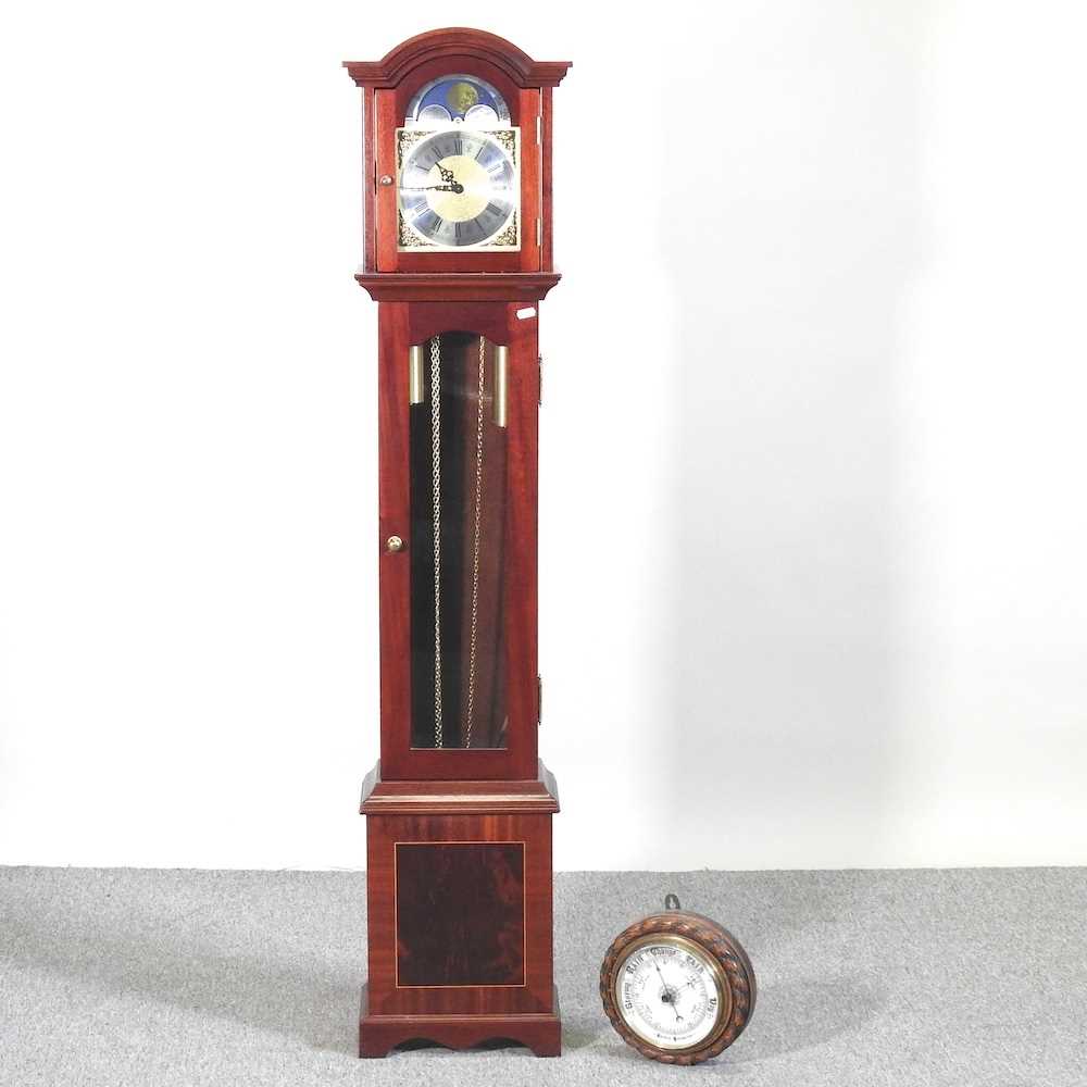 Lot 535 - A granddaughter clock, together with an