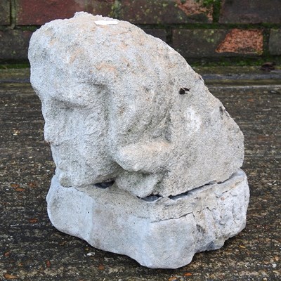 Lot 801 - A cast stone head, 30cm high