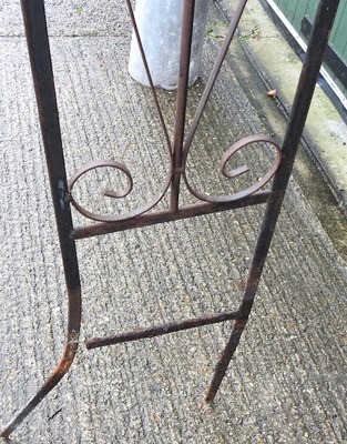 Lot 669 - A black painted wrought iron garden arch,...