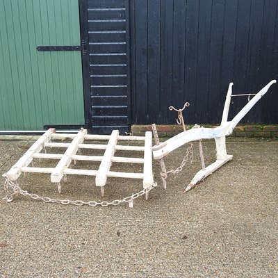 Lot 505 - A vintage farm plough, 220cm long, together...