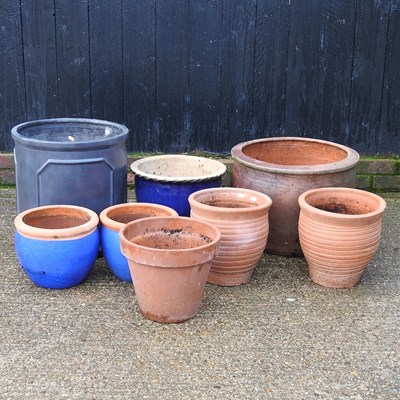 Lot 728 - A faux slate garden pot, 46cm high, together...