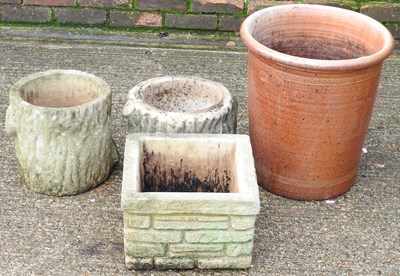 Lot 423 - A pair of cast stone garden pots, together...