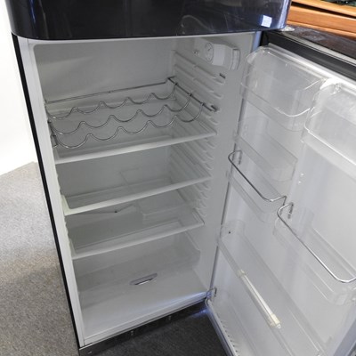 Lot 638 - A black Smeg fridge freezer