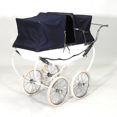 Lot 250 - A 1960's vintage doll's pram, 97cm long