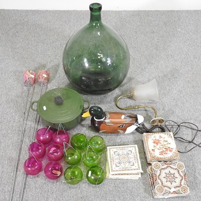 Lot 548 - A green glass carboy, together with tea lights,...