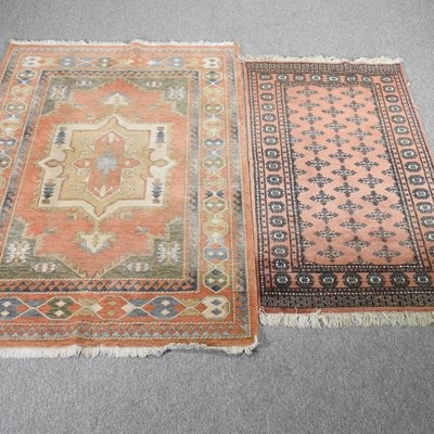 Lot 710 - A modern woollen rug, 193 x 139, together with...