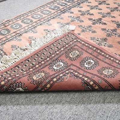 Lot 710 - A modern woollen rug, 193 x 139, together with...