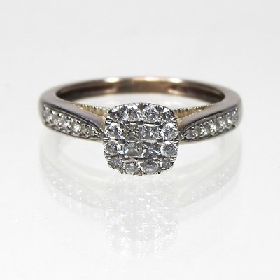 Lot 392 - A diamond cluster ring, of square set design,...