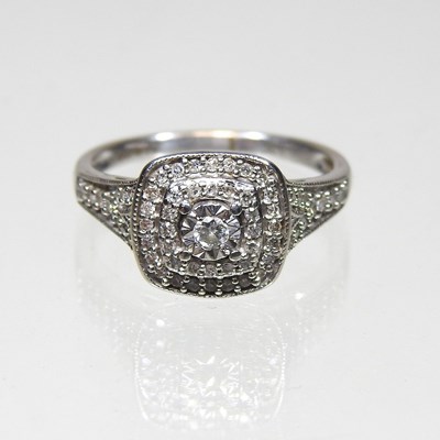 Lot 221 - A 9 carat white gold and diamond cluster ring,...