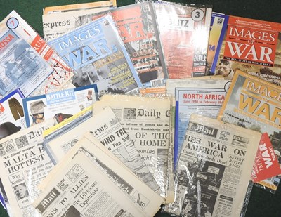 Lot 288 - A collection of World War II newspapers and...