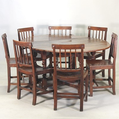 Lot 250 - An 18th century oak gateleg dining table